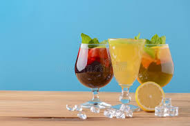Maybe you would like to learn more about one of these? Three Tropical Mixed Drinks With Lime And Lemon And Mint Leaves Served In Different Glasses On Rustic Wooden Table Stock Photo Image Of Fresh Green 172443594