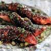 Turquoise plate with galician octopus on a wooden table. 1
