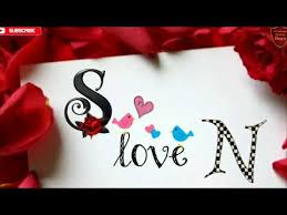 Write nick name on paper heart love quotes pictures,loving you is my life love quotes dps edit with my name for whatsapp,stylish name editor on love photos . S And N Letter Love Images Download