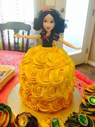 I specially enjoy decorating cakes and that is exactly what i'd like to share with you! Snow White Doll Cake Made With Buttercream Rosettes For A Disney Princess Snow White Bir Disney Princess Doll Cake Princess Doll Cake Snow White Birthday Party
