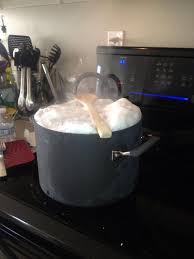 Does a wooden spoon stop boiling over?