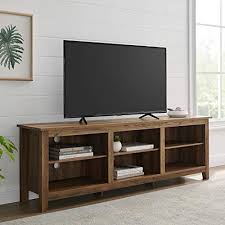 Cabinets located underneath can store extra remotes and cables, or your family's favorite movies so they're within arm's reach when it comes time for movie night. The 8 Best Tv Stands Of 2021