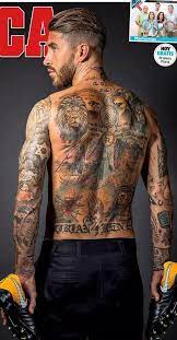 Sergio ramos has a tribute to terror victims across both his armscredit: Greg Rs Follow Greg Rs On Pinterest Pin Master Elrey Tattoos Sergioramos 4 Realmadrid Manner Tattoo Ideen Tattoo Ideen Manner Fussball Tattoo