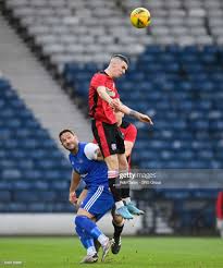 Drumchapel's Adam Douglas beats Tolcross's Michael Yuill to the... News  Photo