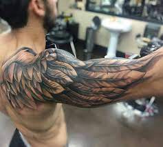 A sleeve tattoo (or tattoo sleeve) is a large tattoo, or a collection of smaller tattoos, that has a unified theme, that covers most or all of a person's arm, usually from shoulder to wrist. Pin By Jordan Blackburn On Tatto Best Sleeve Tattoos Cool Arm Tattoos Wing Tattoo Arm