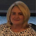 Ginger Robbins of RIATA REAL ESTATE