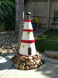 A selection of favorite nautical living room decor and interior design ideas. 46 Lighthouse Homemade Ideas Clay Pot Lighthouse Lighthouse Crafts Clay Pot Crafts