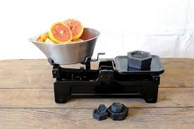 vintage kitchen scale with iron weights
