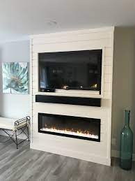 Ask the experts should you install a tv over a fireplace. Shiplap Entertainment Centre With Fireplace Home Fireplace Fireplace Entertainment Center Fireplace Entertainment