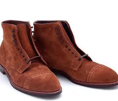 Start by patting (not rubbing) the area with a clean cloth or towel and then apply a layer of cornmeal or talcum powder. Suede Shoes Put This On