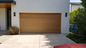 If it is, this guide will help you replace it with the best garage door for your situation—one that suits your home, is easy to operate, and will last for years. Custom Wood Garage Doors Modern Garage Los Angeles By Gates Doors Ironworks Houzz