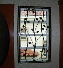 Wrought iron window grill our company has carved a niche for itself in the industry by manufacturing and exporting high quality or.more. Wrought Iron Window Grills Decorative Wrought Iron Grill Modern Window Grill Wrought Iron W Window Grill Design Home Window Grill Design Modern Window Grill