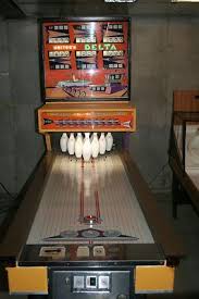 Later, shuffleboard tables were built, originally 32 feet long, then shortened to 28 feet and then eventually 22 feet. Williams United Delta Puck Shuffle Bowling Arcade Game Arcade Games Shuffleboard Games Arcade Game Machines