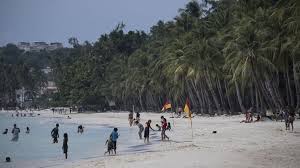 Nsw had 83 new cases, victoria 51, queensland 37, south australia many of sydney's most famous beaches will be closed on sunday. Boracay Beach Section Closed After Tourist Filmed Burying Nappy Bbc News