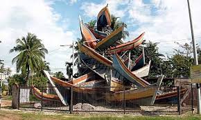 This monument commemorating the event was constructed using 26 fishing boats which were damaged by. Facebook