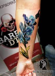 Black 'n' grey buddha backpiece with color accents (4 likes) mariano. Realistic Flower Tattoo Realistic Tattoo Flower Real Art Blue Forearm Tattoo Bilder Arm Realistische Blume Tattoo Blumen Tattoo Rucken