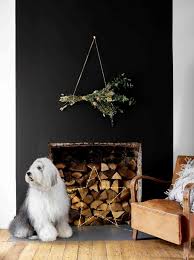 This brilliant living room makeover, shared by clare jordan, shows how sophisticated and powerful this brooding paint shade. How To Use A Black Feature Wall For A Christmas Fireplace Dulux