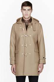 We've got saint laurent paris outerwear starting at $1003 and plenty of other outerwear. Saint Laurent Camel Classic Duffle Coat In Natural For Men Lyst