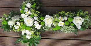Whit was a supporter and lover of art in. Funeral Tribute White Floral Cross Driftwood Flowers
