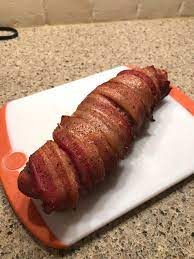 Cut the tenderloins crosswise into pieces about 4 centimeters long (you should have 8 to 10 pieces total). Bacon Wrapped Pork Tenderloin On Traeger Smoking