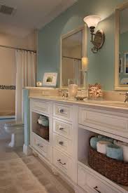 Here its magical powers turned a beige builder grade bathroom into a chic powder room. Beach Bathroom Beach Style Bathroom Bathroom Inspiration Decor Bathroom Design Decor