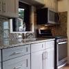 Two door cabinet with three drawers and two interior shelves. 3