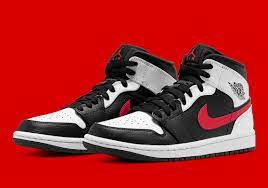 A gym red swoosh appears on each side of the sneaker with a matching embossed gym red wings logo on the ankle. Air Jordan 1 Mid White Black Red 554724 075 Sneakernews Com