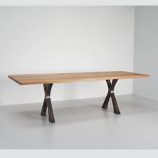 Additionally, its legs play a key role in the uniqueness of this design. Exe Rectangular Dining Table Modern Furniture By Tom Faulkner