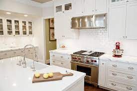 Jun 24, 2021 · today, kitchen designs are shifting away from the standard white or neutral space, and homeowners are embracing bolder, brighter colors instead. White Shaker Kitchen Cabinets With Mini Subway Tile Backsplash Transitional Kitchen