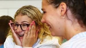 Broad smiles and hearty congratulations all round as Channing School pupils  receive GCSE results'