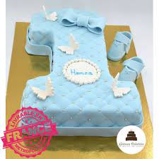 Trois etage chocolat /fraise/framboise poser sur socle de polystyrene decore fait en chocolat blanc a partir d un moule speciale bebe rose en mousse. Gateau Anniversaire Chiffre 1