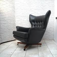 G Plan Vintage Armchair Wing Back Swivel Black Mid Century Etsy Mid Century Swivel Chair Vintage Furniture For Sale Armchair Vintage