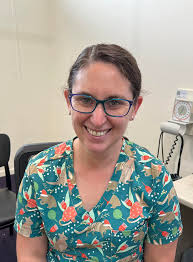 The festive scrub tops are officially