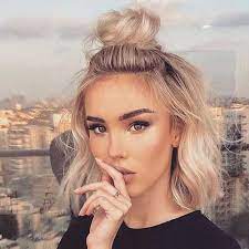 Tie your top hair into a luscious half ponytail and leave the remaining hair down. Simple Cute High Half Bun Updo For Short Hair Cute Hairstyles For Short Hair Short Hair Bun Hair Styles