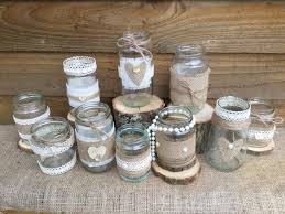 Ten Handmade Rustic Glass Jar Wedding Table Centrepieces Made From Glass Jam Jars With A Lace Hessian Twine In 2020 Wedding Jars Jam Jar Crafts Decorative Glass Jars