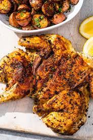 Chicken Under A Brick With Herb Roasted Potatoes Cook S Illustrated Recipe Herb Roasted Potatoes Chicken Under A Brick Chicken Dinner