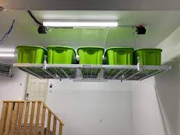 We have garage ceiling lifts available for light duty work such as hanging your bicycle on a bike lift or a floor mounted lift to help you double stack heavier toys like motor cycles and atv's and everything in. Garage Boss 4x8 Motorized Overhead Storage Garage Boss