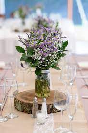 Rustic Centerpiece For A Shower Celebration Or Reception Wood Slab Base Flower Centerpieces Wedding Wedding Table Centerpieces Rustic Wedding Centerpieces