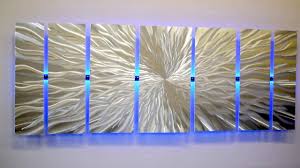 Consider purchasing multiple sets to fill large wall space, or hang the small, medium and large starburst wall art pieces for a truly spectacular and modern display. Amazon Com Modern Abstract Metal Wall Art Large Metal Art Panels Cosmic Energy Led Color Changing Led Sculpture Painting Decor Rgb Everything Else
