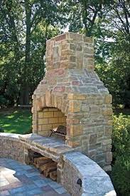 Owners like the weight of this model, the availability of a nice view from all angles, and the chimney for smoke removal. Ep Henry Outdoor Stone Fireplaces Outdoor Fireplace Designs Outdoor Stone