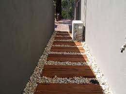 Stratco Authorised Dealer In Mornington Peninsula Drought Tolerant Garden Side Yard Landscaping Garden Yard Ideas