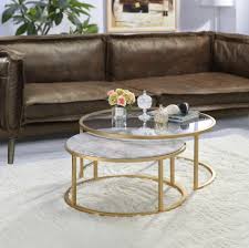 With a clear top or black base this round glass coffee table from mango steam meets the requirements of the users and make a perfect product to splurge. 2 Piece Glass Nesting Tables For Living Room Golden Round Glasstop Coffee Table Set With Metal Base For Small Place Separate Or Together Nesting Tables Accent Furniture Femsa Com