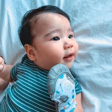 Pancho still loooves massaging his gums using his @nubyph teething mitten!  As a (super) late birthday treat, since Pancho turned one last 2/8, we are  giving away 2 teething mittens each to