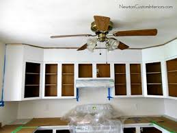 The custom stain color took a few times to reach the perfect shade. How To Paint Oak Cabinets Tips For Filling In Oak Grain