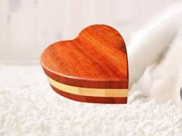 Many people expect a light, flaky material similar to wood ash. China Heart Shaped Traditional Wood Pet Cremation Ashes Urn Boxes China Pet Urn And Wood Urn Price