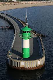 New Travemunde Nordmole Lighthouse Schleswig Holstein Travemunde Germany Lighthouse Lighthouses Photography Beautiful Lighthouse