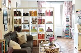 You can also borrow some bedroom square footage to create a large living room. Live Large In A Small Space How To Divide A Studio Apartment