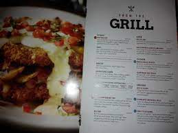 Going to dine at t.g.i. Part Of The Menu Notice The Single Pic And The Finely Printed Description Picture Of T G I Friday S Petaling Jaya Tripadvisor