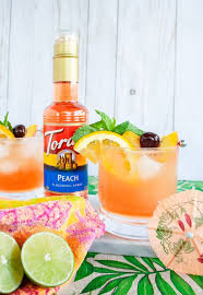 Peachy Mai Tai Elle Talk Recipe Rum Cocktail Recipes Rum Punch Recipes Torani Recipes
