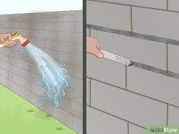 The featured block wall has a rigid footing support and a durable stonetree precast to improve strength. 4 Ways To Cover Exterior Cinder Block Walls Wikihow